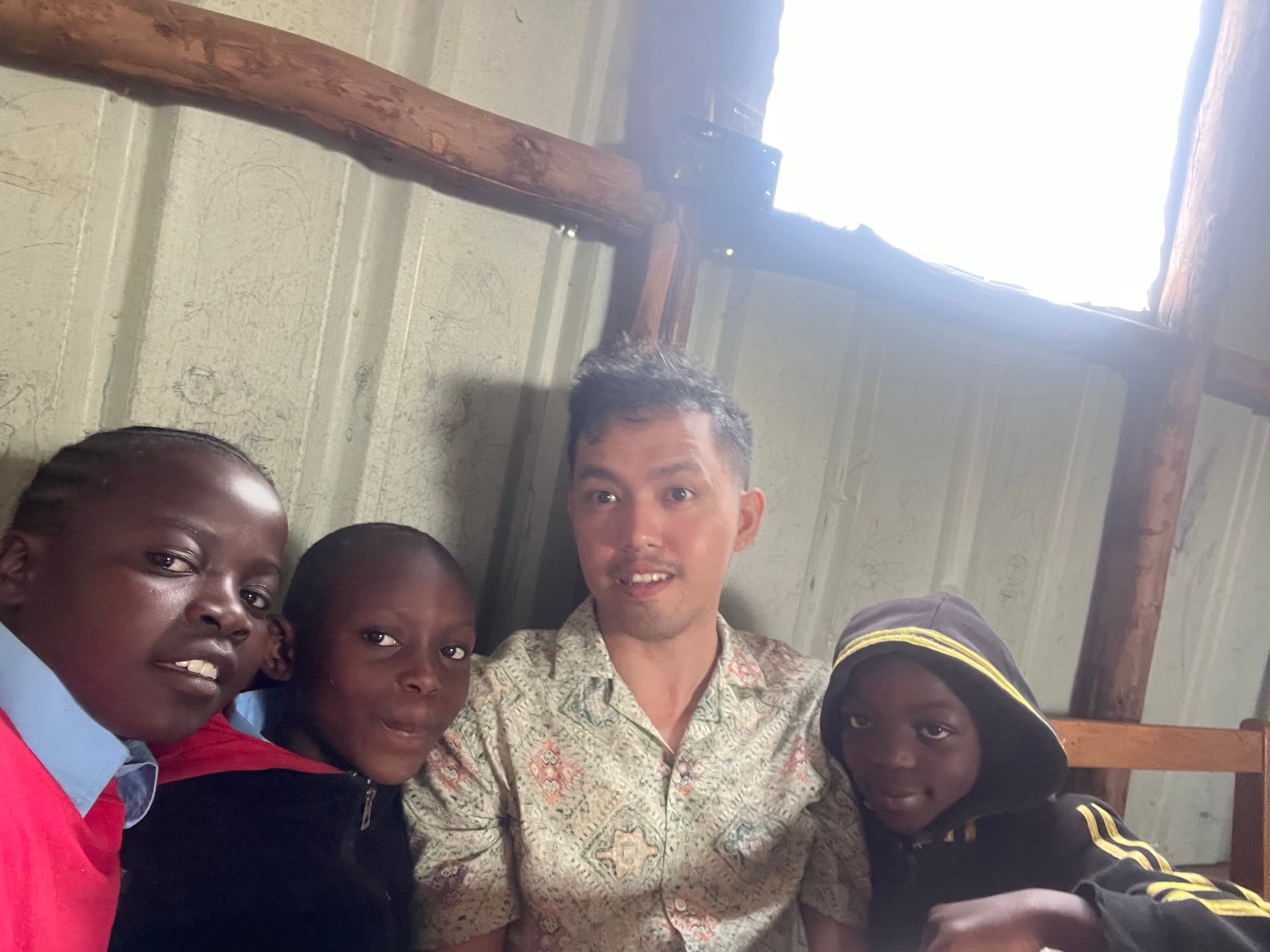 Pam volunteering with three children